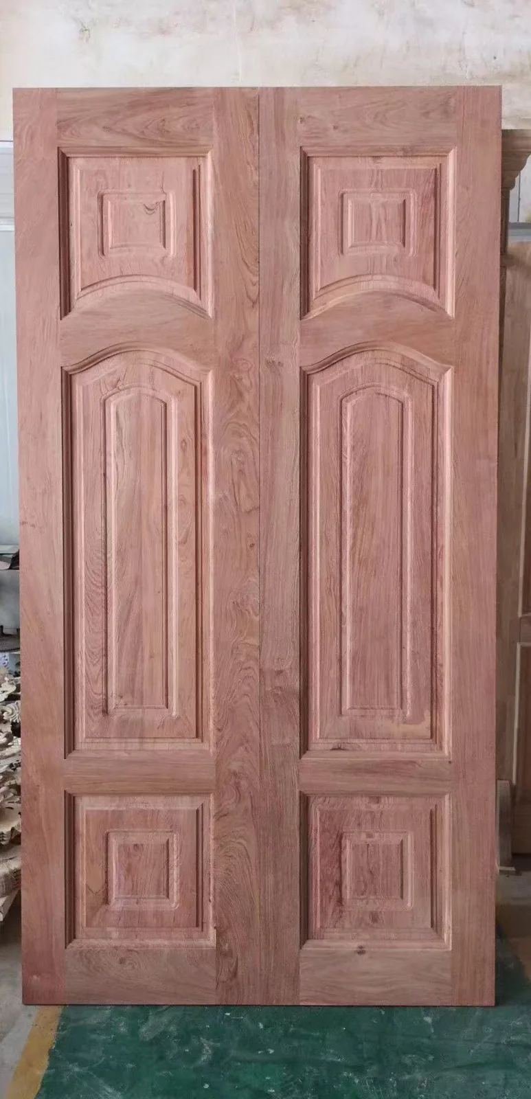 Carved wooden door panel